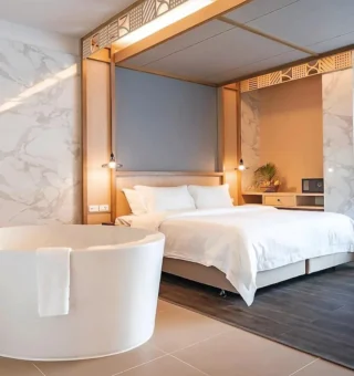 Deluxe Suite - Bed at Anana Ecological Resort Krabi