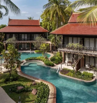 Lagoon pool winding between Thai pavilions at Anantara Hua Hin Resort