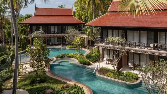 Lagoon pool winding between Thai pavilions at Anantara Hua Hin Resort