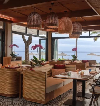 Restaurant with sea views and rattan lanterns at Anantara Hua Hin Resort