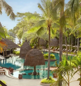 Pool surrounded by tropical gardens at Anantara Hua Hin Resort