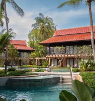Pool and red-roofed Thai buildings at Anantara Hua Hin Resort