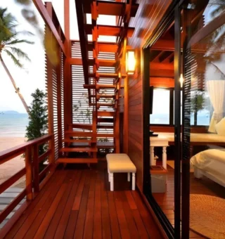 Two-storey wooden beach villa interior at The Blue Sky Resort Koh Payam