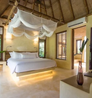Guest room at High Season Pool Villa & Spa