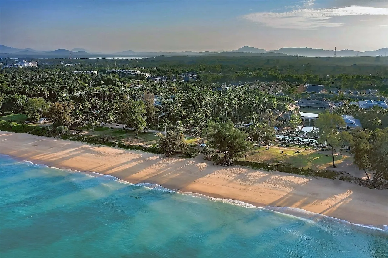 Aerial view of Mai Khao Beach and the resort at JW Marriott Phuket Resort & Spa