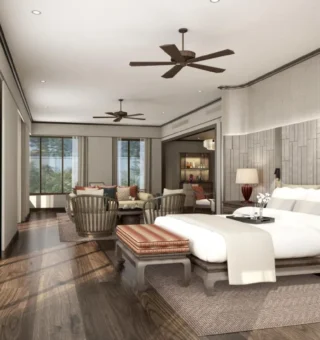 Grand deluxe room with sitting area at JW Marriott Phuket Resort & Spa
