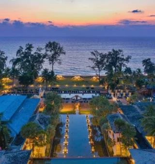 Resort grounds and beach at dusk at JW Marriott Phuket Resort & Spa