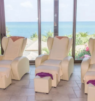 Spa pedicure lounge with sea view at The Villas by Kanda Residences