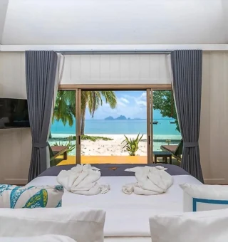 Premier Beachfront Villa Double, 1st Row - Bed at Koh Mook Sivalai Beach Resort
