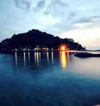 Koh Nang Yuan at twilight seen from a jetty at Nangyuan Island Dive Resort