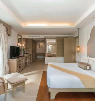 Family Suite (2 bedrooms) - Bed at Ravindra Beach Resort & Spa