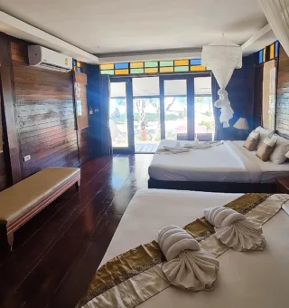 Deluxe Family Ocean View Bungalow - Bedroom at Thanya Beach Resort