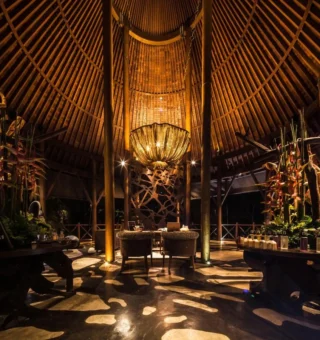 Moody interior with woven pendant light at The Slate Phuket