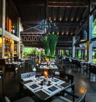 Restaurant dining room with open kitchen at The Slate Phuket